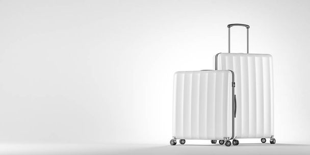 Two stylish white suitcases standing over white background. Concept of tourism and travelling. 3d rendering mock up - Foto, Imagem