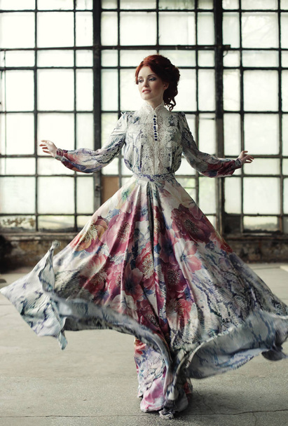 elegance woman with flying dress in palace room - Zdjęcie, obraz
