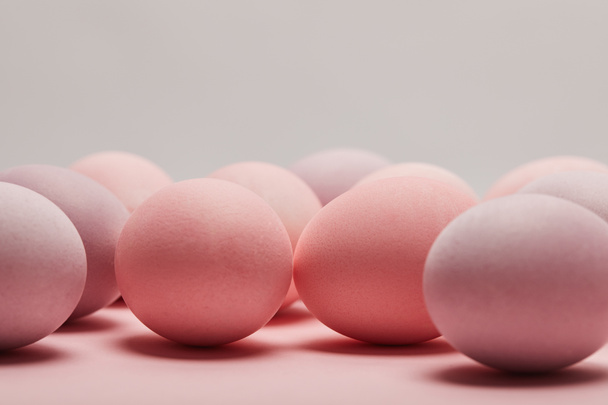 easter eggs on grey background with copy space - Foto, Bild