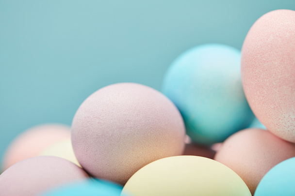 selective focus of painted easter eggs on blue background   - Foto, Imagem