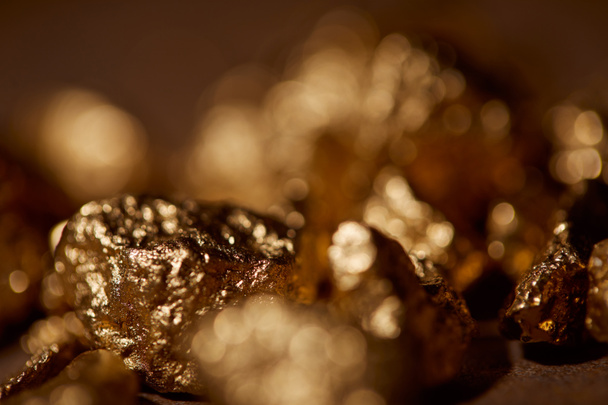 selective focus of golden stones with blurred background - Foto, Imagem