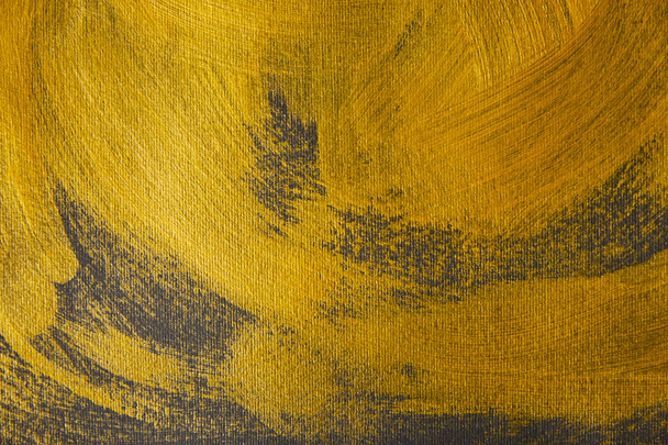 different golden brushstrokes drawn on grey background - Fotoğraf, Görsel