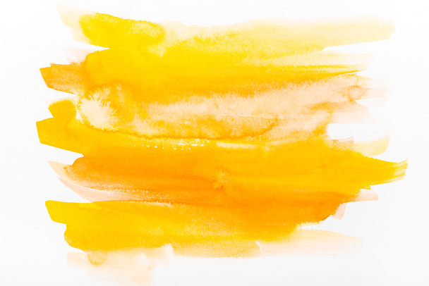 vista superior de pinceladas aquarela amarela no papel branco
  - Foto, Imagem