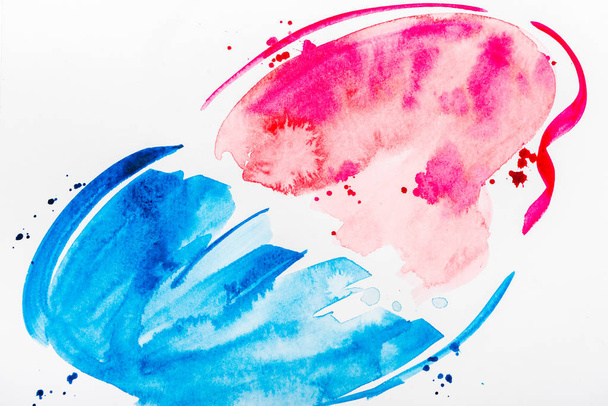 top view of pink and blue brushstrokes and spills on white paper - Fotoğraf, Görsel