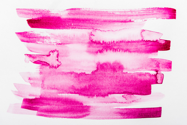 bovenaanzicht van roze penseelstreken op wit papier - Foto, afbeelding