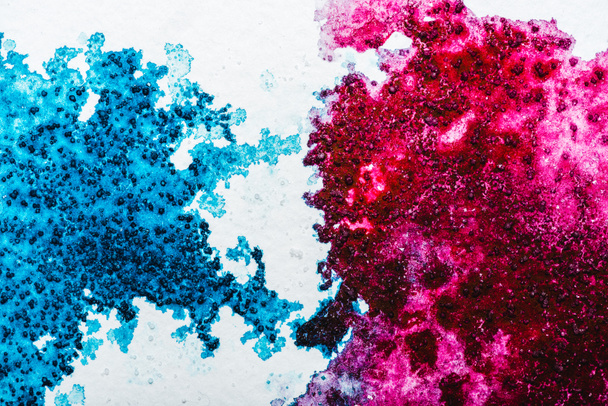 top view of blue and pink watercolor spills on white background - Photo, image
