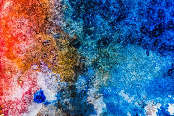 top view of blue, red and white watercolor spills with copy space  - 写真・画像