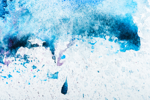 top view of blue watercolor spill on white background  - Фото, зображення
