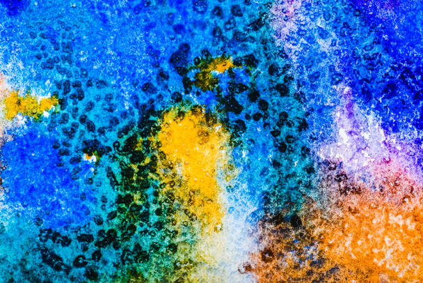 вид зверху на блакитні, жовті та помаранчеві акварельні розливи
  - Фото, зображення