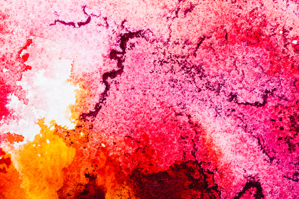 top view of pink, white and orange watercolor spills with copy space  - 写真・画像