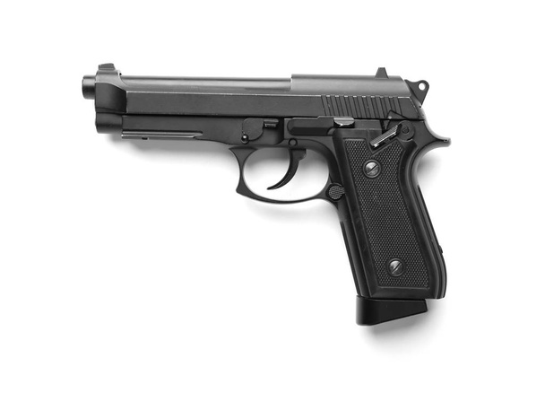 Pistola sobre fondo blanco
 - Foto, Imagen