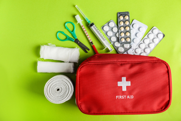 First aid kit on color background - Photo, Image