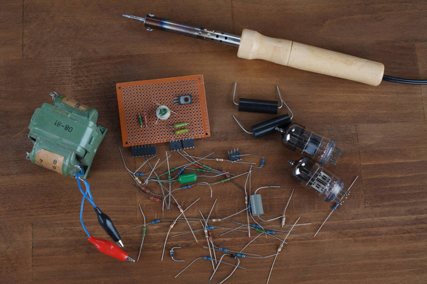 soldering iron - do it yourself concept with vintage retro electronic components - Foto, immagini
