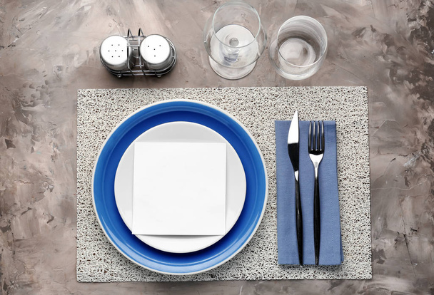 Simple table setting on grey background - Photo, Image