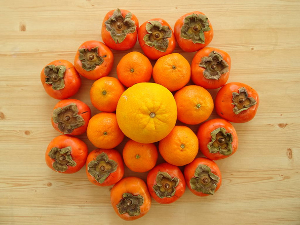 Orange Colour Fruits - Oranges, Tangerines and Persimmons on Woo - Fotoğraf, Görsel