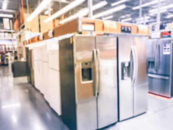 Blurry background refrigerators on display at hardware store in USA - Photo, Image