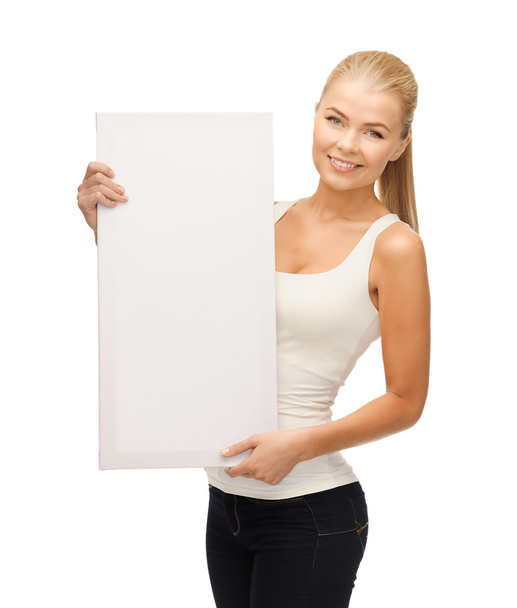 Woman with white blank board - Foto, afbeelding