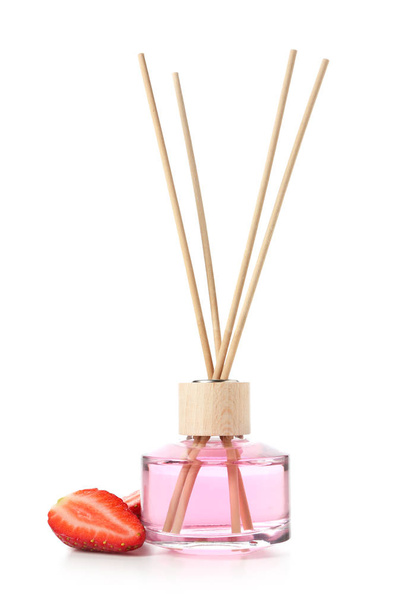 Reed diffuser and strawberry on white background - Photo, Image