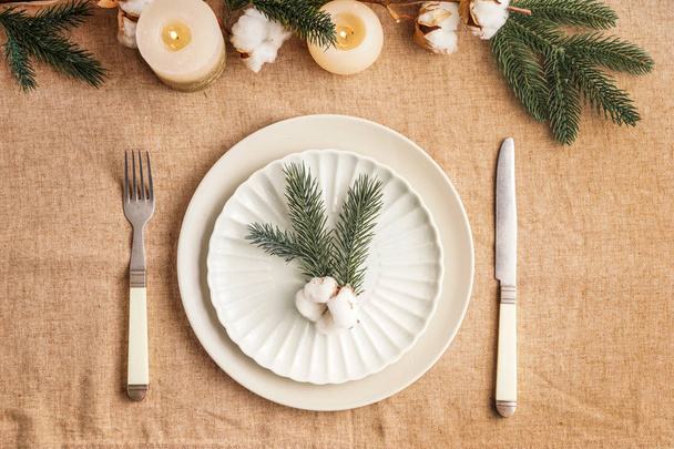 Festive table setting for Christmas dinner - Фото, изображение