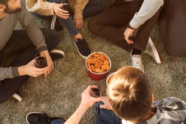 Group of friends eating nuggets at home - Fotoğraf, Görsel