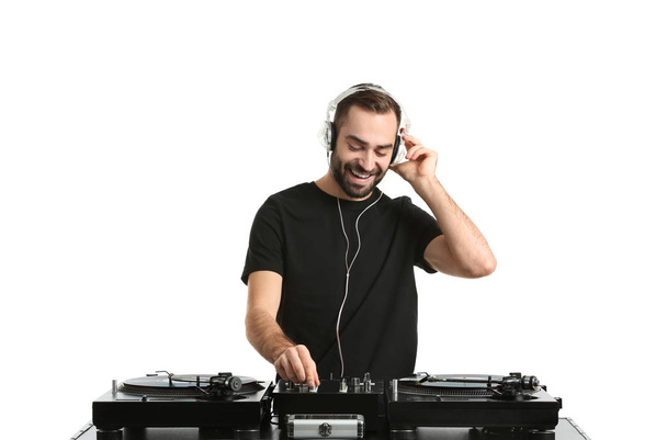 Male DJ playing music on white background - Φωτογραφία, εικόνα