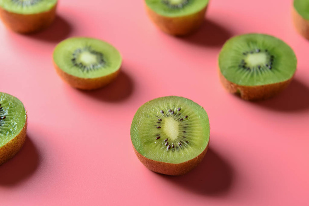 Tasty sliced kiwi on color background - Photo, Image