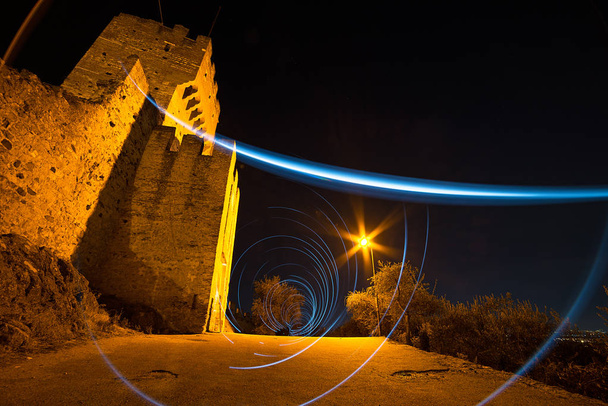 Movimientos circulares con luz en el castillo de Marostica
 - Foto, Imagen