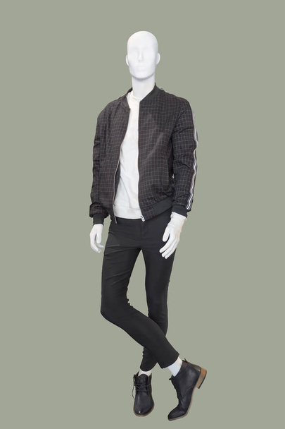 Full-length male mannequin dressed in casual clothes (jacket and trousers), isolated.  No brand names or copyright objects. - Photo, Image
