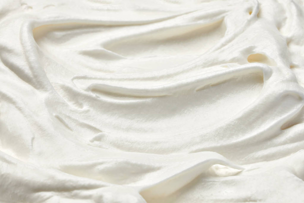 close up of  a white whipped or sour cream on white background - Fotó, kép