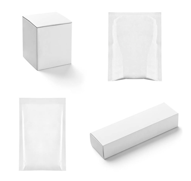 Sammlung verschiedener weißer Schachteln und Pakete auf weißem Hintergrund. Jeder wird einzeln erschossen - Foto, Bild