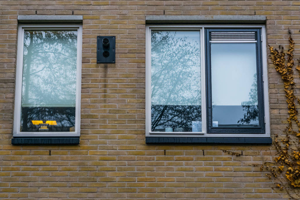 Windows in a brick wall, Modern dutch city architecture, architectural background - Photo, Image