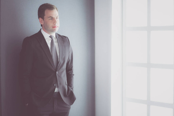 Portrait of a confident mature businessman standing outside. - Foto, imagen