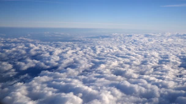 Stunning footage of aerial view above clouds from airplane - Footage, Video