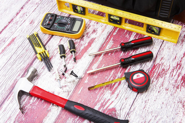 construction tools on the wooden floor - Foto, imagen