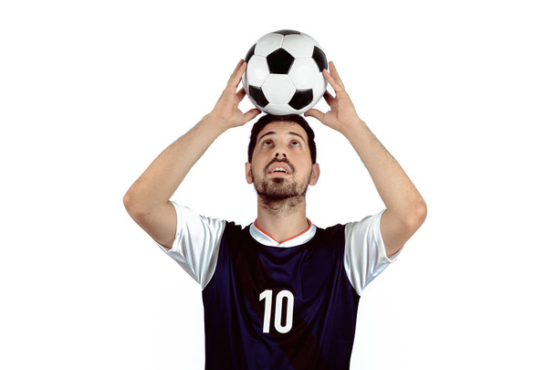 Portrait of young man with football ball. Sport concept. - Фото, изображение
