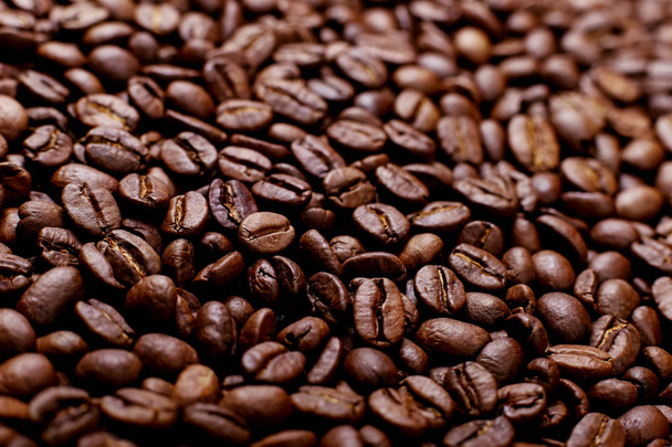Aroma roasted coffee beans, brown background. Beans close up. - Foto, immagini