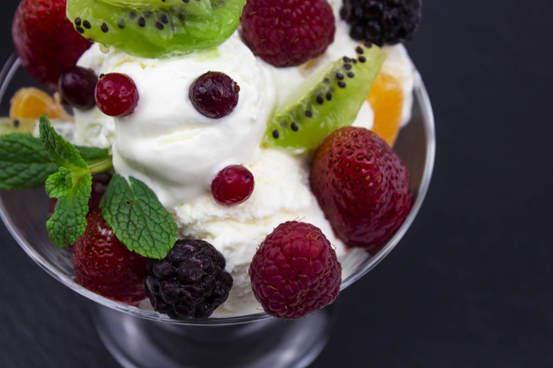 Closeup of ice cream with berries and mint. i - Photo, Image
