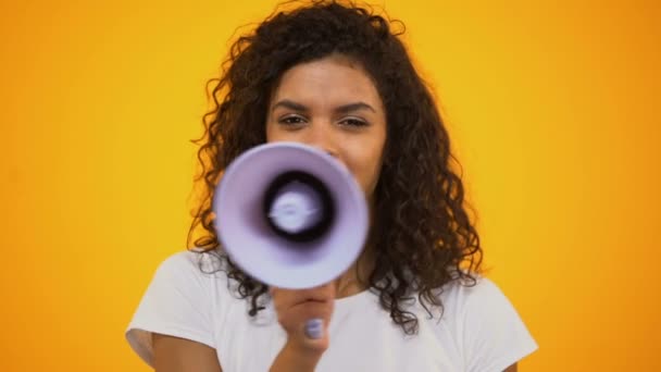 African-American woman using megaphone for protest, public opinion, politics - Imágenes, Vídeo