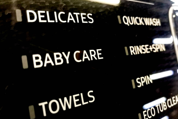 Focus on Delicates, Baby Care, Towels of washing machine program control dial - Photo, Image