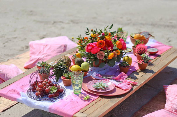 Festive table decor, beautiful event venue, creative beach wedding decor,  - Fotoğraf, Görsel
