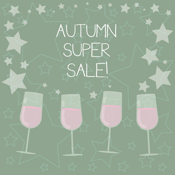 Handwriting text writing Autumn Super Sale. Concept meaning having great discounts products on season after summer Filled Cocktail Wine Glasses with Scattered Stars as Confetti Stemware. - Photo, Image