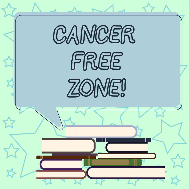 Handwriting text writing Cancer Free Zone. Concept meaning club for educating showing about means of cancer prevention Uneven Pile of Hardbound Books and Blank Rectangular Color Speech Bubble. - Photo, Image