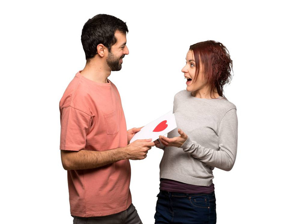 Пара в день валентинки з денною карткою валентинки на ізольованому білому тлі
 - Фото, зображення