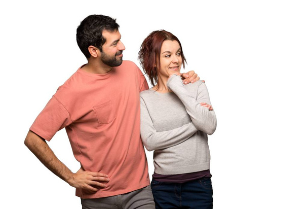 Couple in valentine day looking to the side on isolated white background - Photo, image