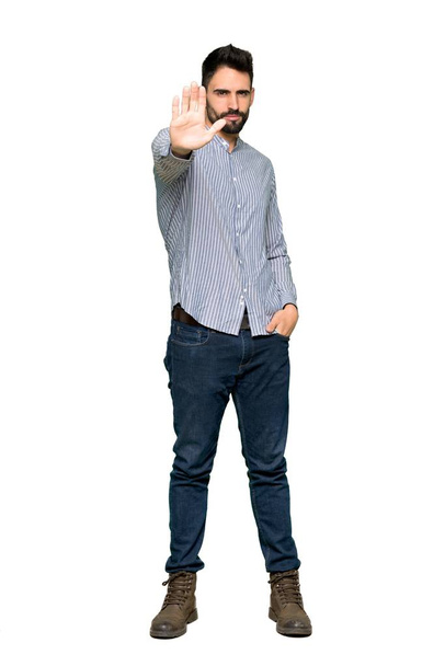 Full-length shot of Elegant man with shirt making stop gesture denying a situation that thinks wrong on isolated white background - Foto, Imagem