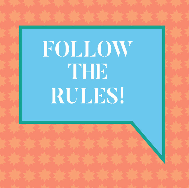 Writing note showing Follow The Rules. Business photo showcasing act in agreement or compliance with obey them Firmly Blank Rectangular Color Speech Bubble with Border photo Right Hand. - Photo, Image