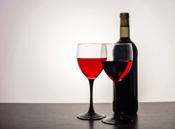 wine glasses and bottle on white background - Foto, imagen
