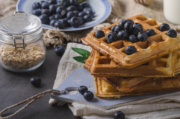 Crispy homemade waffles with berries, topped maple syrup - Fotoğraf, Görsel