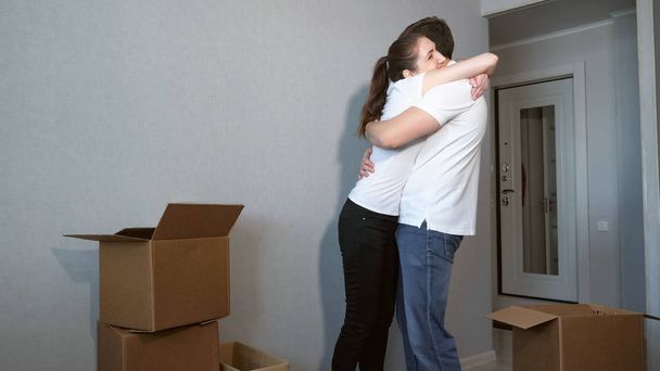 Young couple very happy and excited about moving into new apartment - Foto, imagen