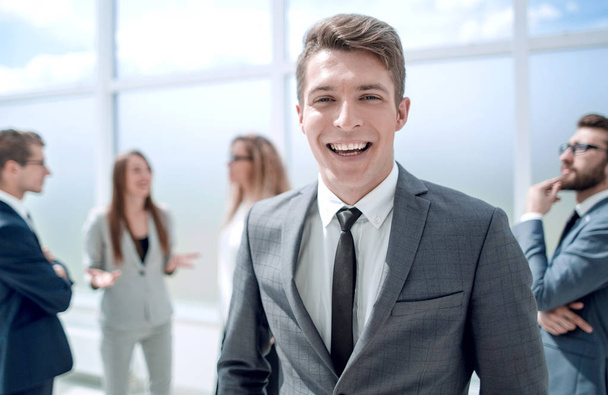 young businessman standing in the office lobby - Foto, imagen